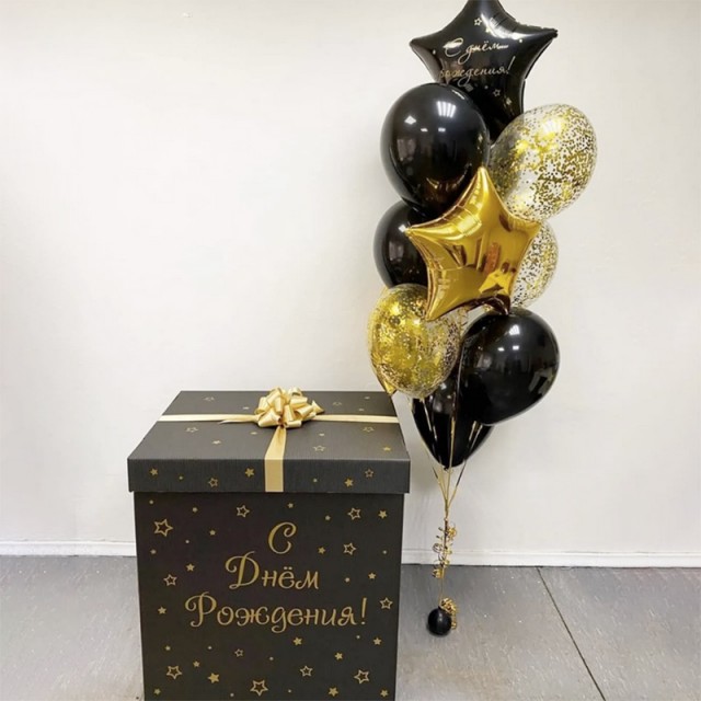 Коробка с шариком внутри черного и золотого цвета